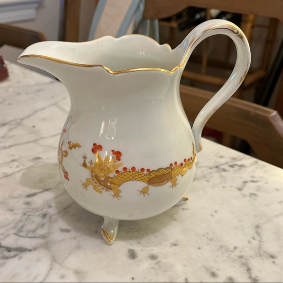 Antique dragon pattern pitcher. 5 1/2x 3 1/2.
